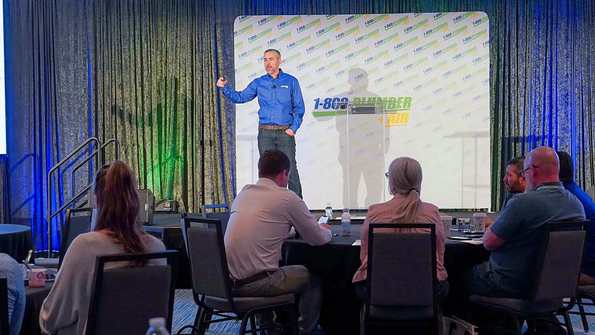 Mark Collins presenting to franchise owners at Elevate Conference